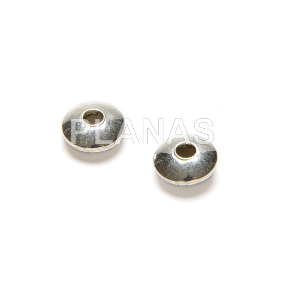 Disc spacer in sterling silver. 4x2mm.