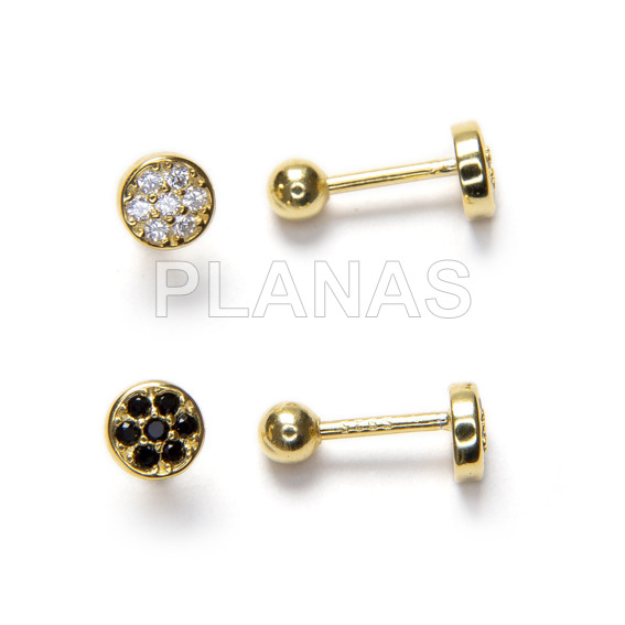 Earrings with screw closure in sterling silver and gold bath with black zircons.