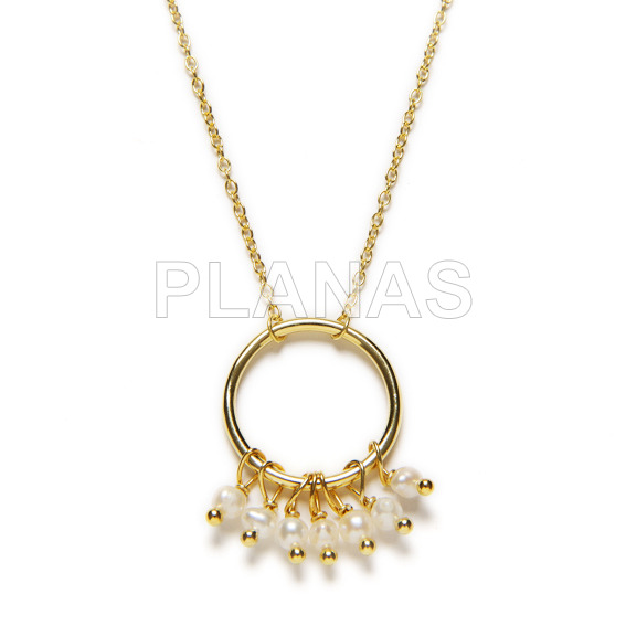 Pendant in sterling silver and gold bath with cultured pearls.