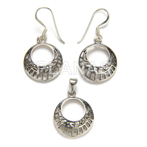 Set in sterling silver, earrings and pendant.