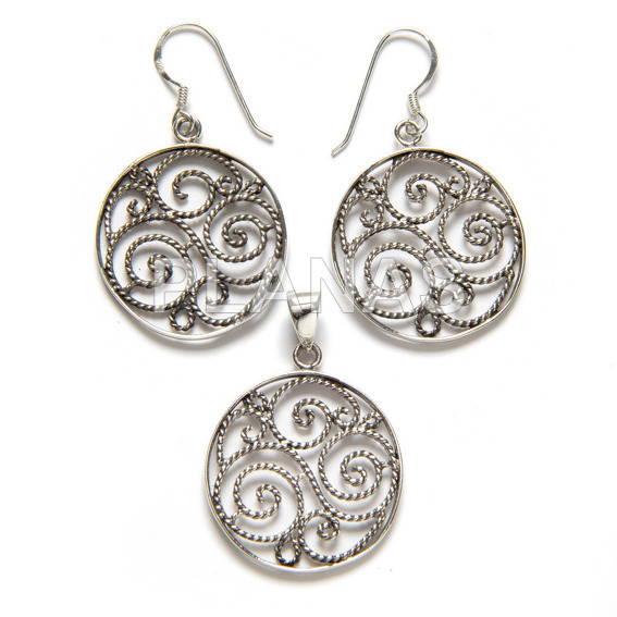 Set in sterling silver, earrings and pendant.