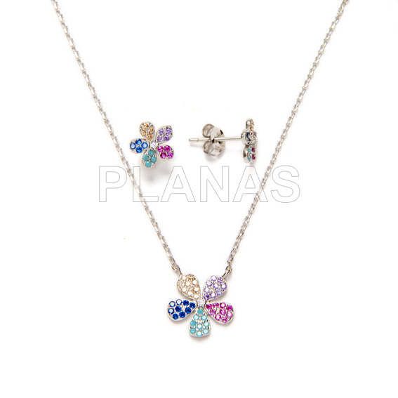 Set in rhodium-plated sterling silver with colored zircons, earrings and pendant.flor.