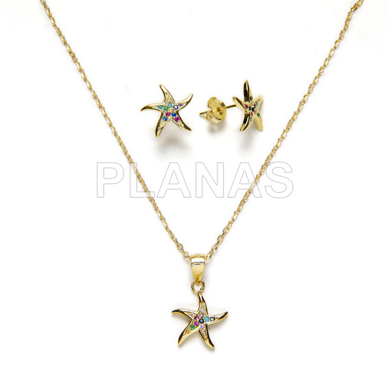 Set in sterling silver and gold bath with colored zircons. star of the sea.