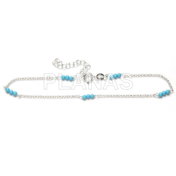 Anklet in sterling silver and enameled turquoise beads.