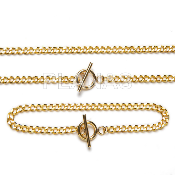 Set of necklace and bracelet in brass and stainless steel in gold bath.
