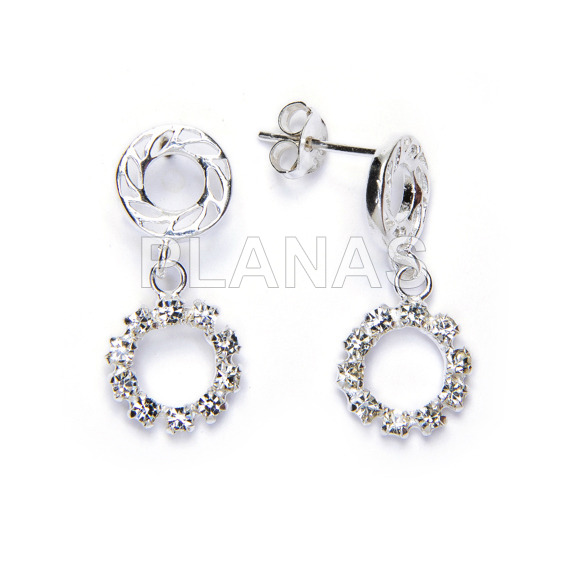 Earrings in sterling silver and white crystal. circles.