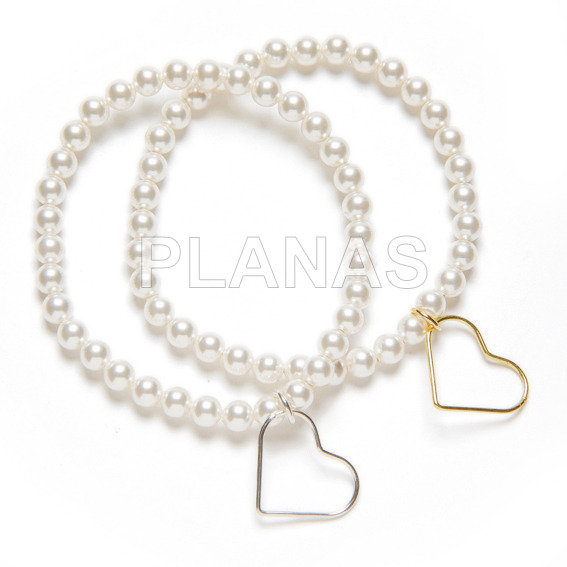 Elastic bracelet with 5mm swarovski pearls and sterling silver heart.