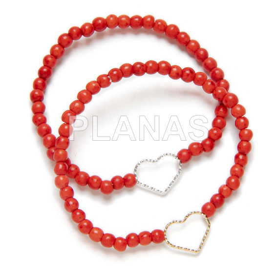 Elastic bracelet with diamond heart in sterling silver and coral.