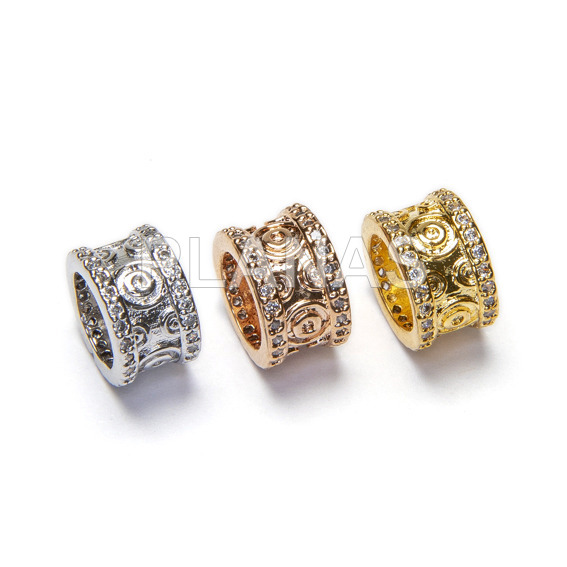 Brass and zirconia interpiece.