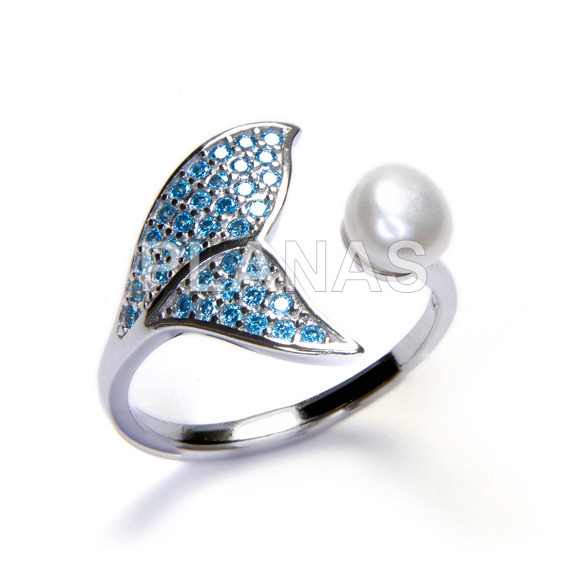 Ring in sterling silver and blue zircons and cultured pearl. whale