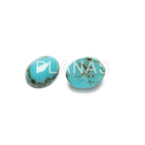 Oval cabochon in turquoise.