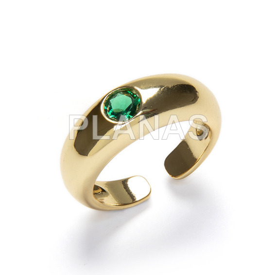 Open ring in brass and gold bath, emerald color.