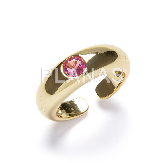 Open ring in brass and gold bath, ruby color.