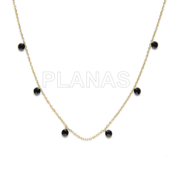 Necklace in sterling silver and gold bath with black zircons.