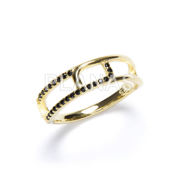 Ring in sterling silver and gold bath with black zircons.