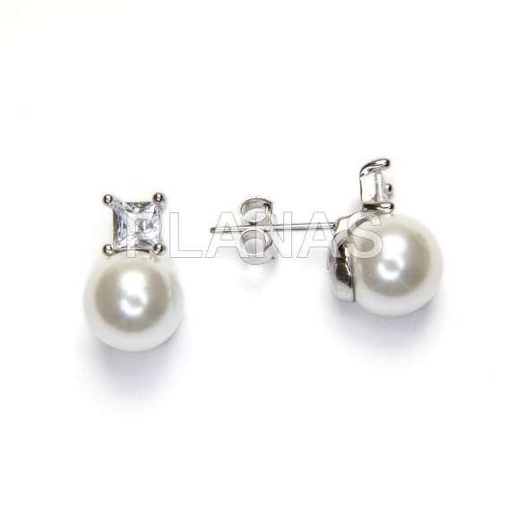 Rhodium plated sterling silver earrings with 8mm shell pearl.