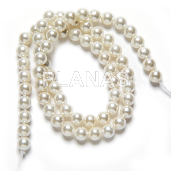String of high quality 7mm glass pearls, color white.
