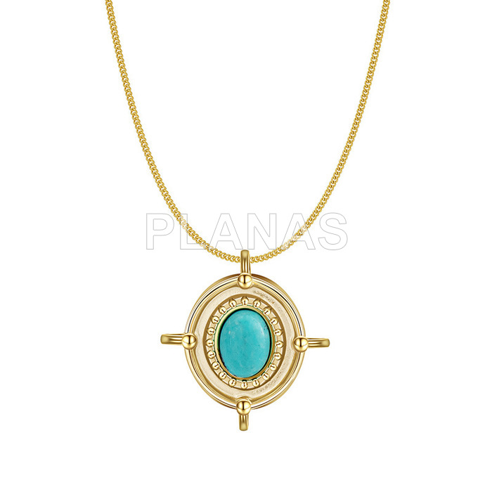 Pendant in stainless steel and gold plating with turquoise stone.
