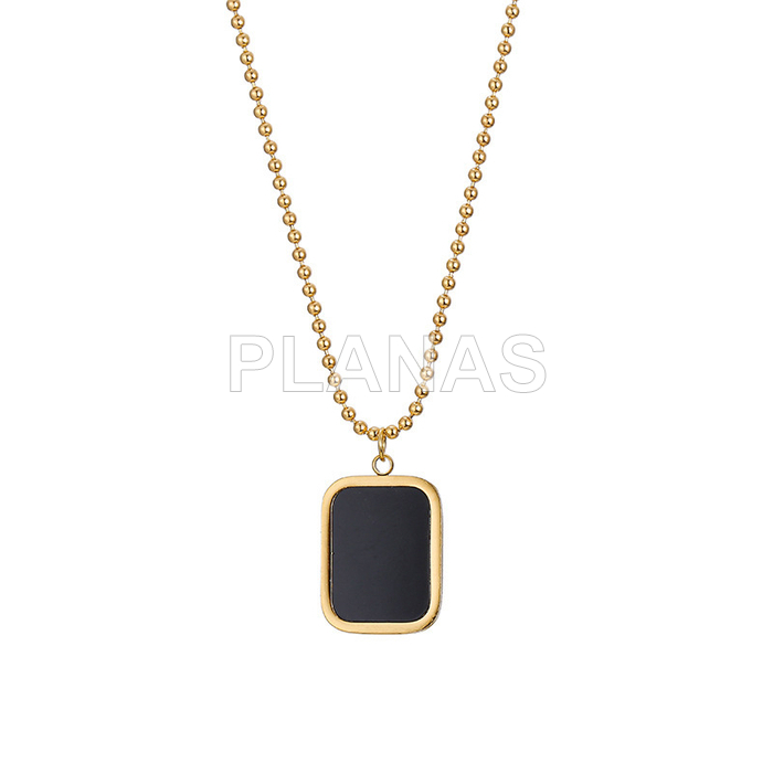 Pendant in stainless steel and gold plated with black enamel.