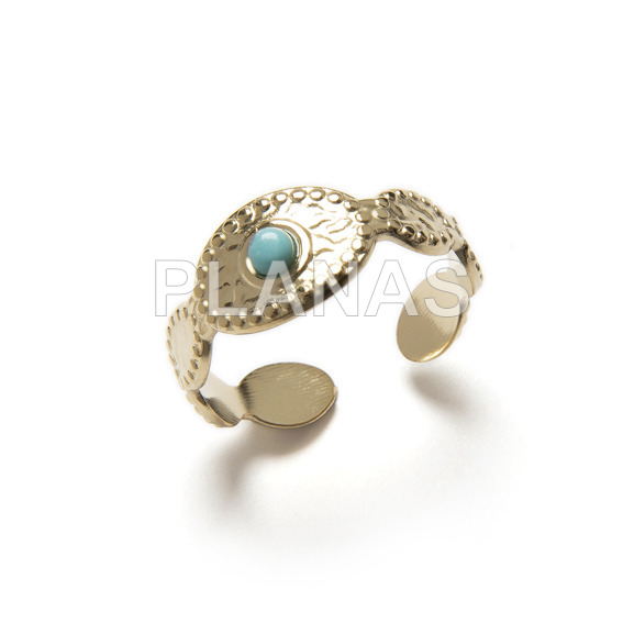 Ring with turquoise in stainless steel and gold plating.
