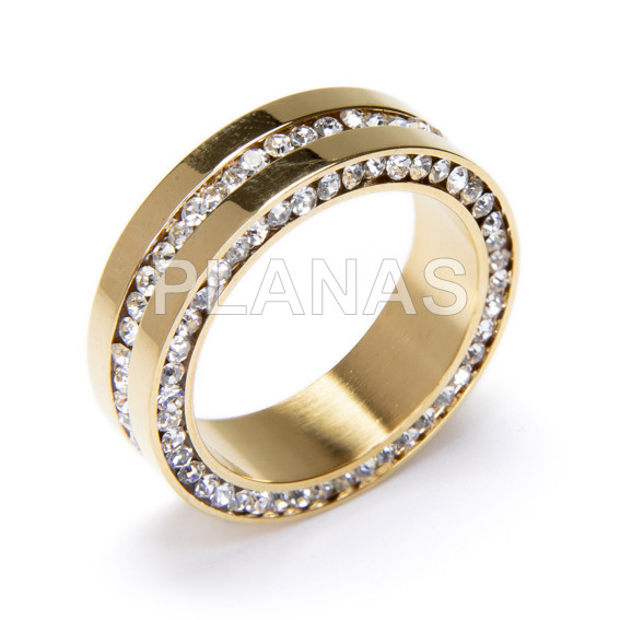 Ring in stainless steel and gold plated with zircons.