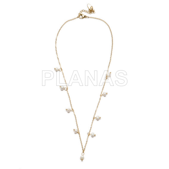 Pendant in stainless steel and gold plated with cultured pearls.