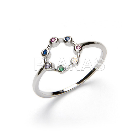 Ring in rhodium plated sterling silver and color zircons. circle.