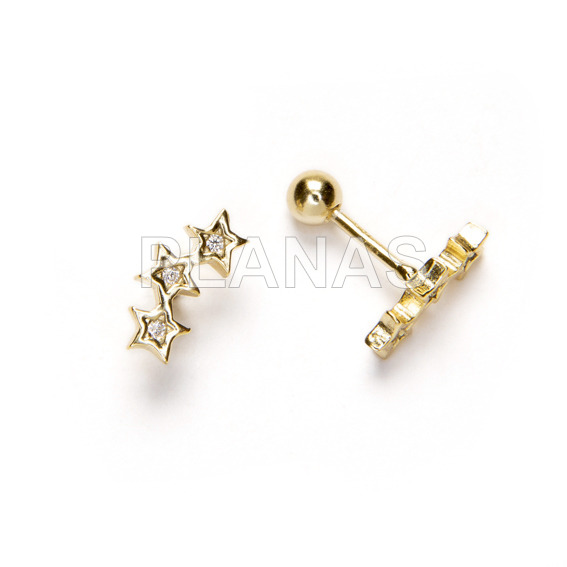 Sterling silver and gold plated earrings with zircons and screw closure. stars.