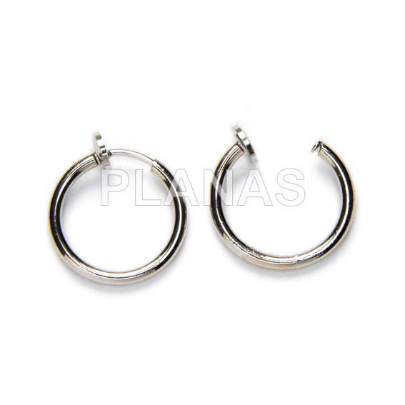 Stainless steel rings with return closure.