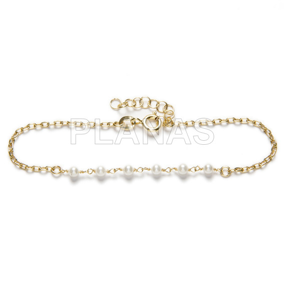 Pulsera en plata de ley y Baño oro con perlas sintéticas.