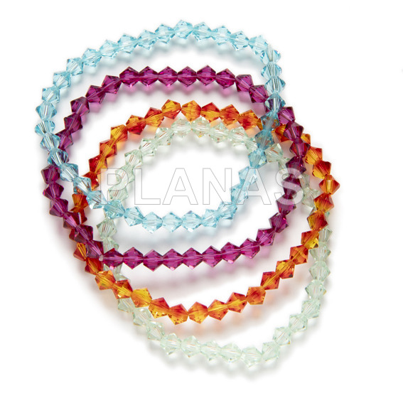 Pack 4 elastic bracelets austrian crystal components in different colors.