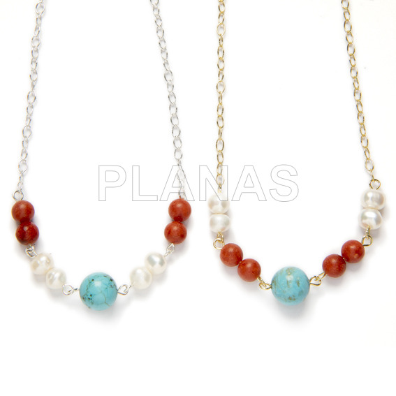 Necklace in sterling silver with cultured pearls, coral and turquoise.