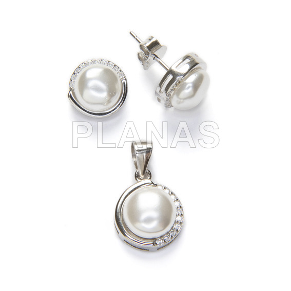 Set in sterling silver rhodium plated zircons and synthetic pearl.