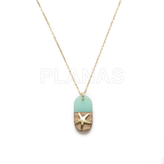 Necklace in sterling silver and gold bath with piece in wood and turquoise resin. star of the sea.