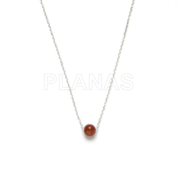 Necklace in sterling silver with a coral ball.