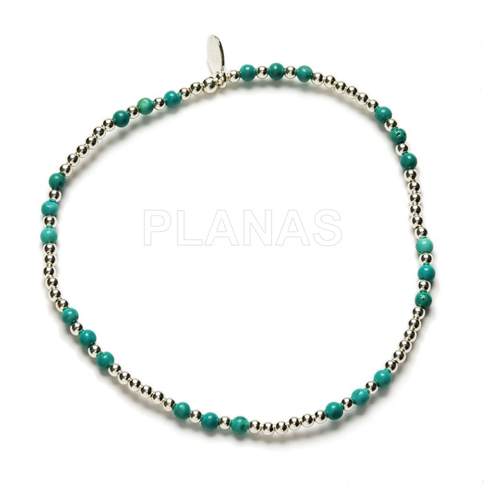 Elastic bracelet in sterling silver and turquoise.