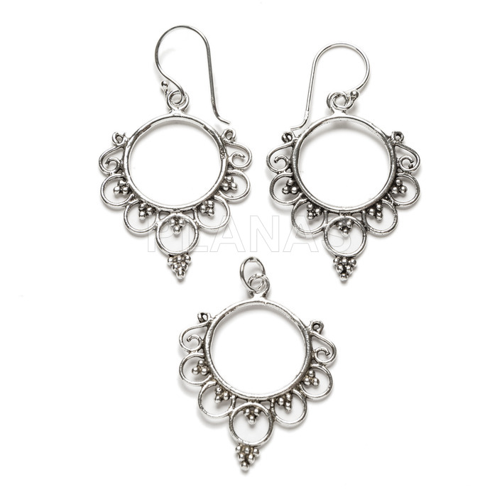 Sterling silver earrings and pendant.