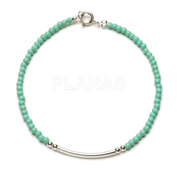 Bracelet in sterling silver and turquoise seed beads.