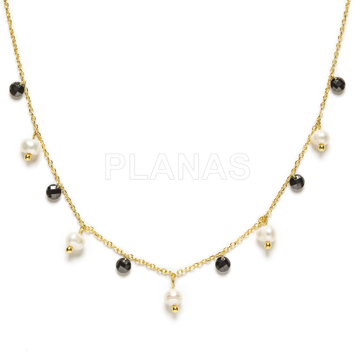 Necklace in sterling silver and gold plated with cultured pearls and first quality crystal.