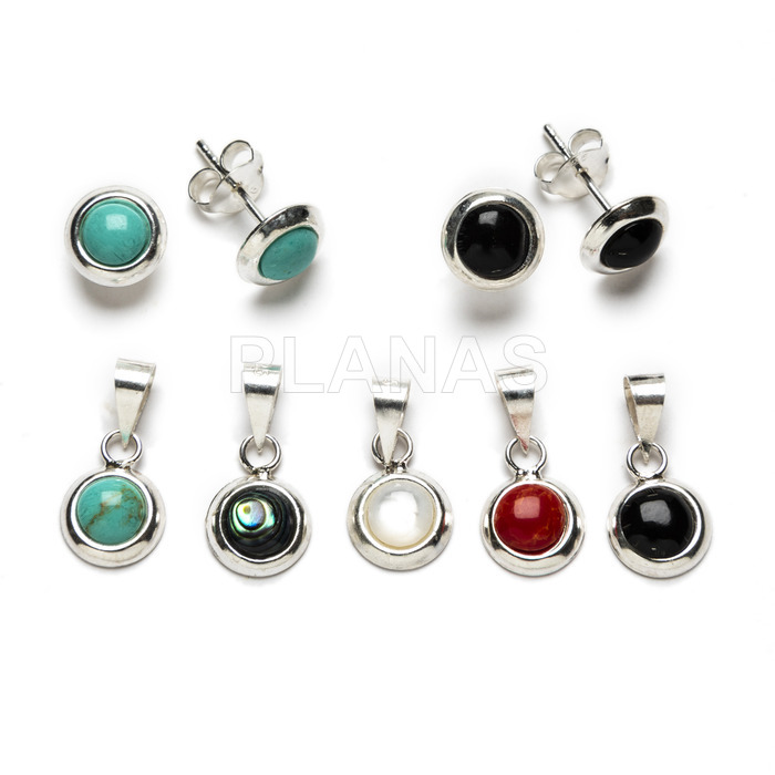 Sterling silver and enamel earrings and pendants.