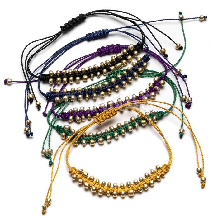Adjustable nylon bracelet, golden rocalla beads.