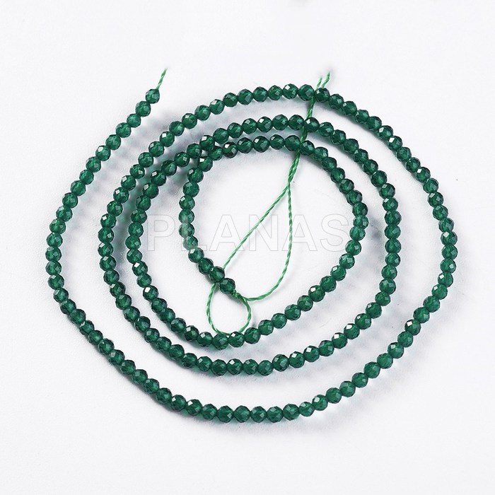 String of 2mm green crystal faceted balls.