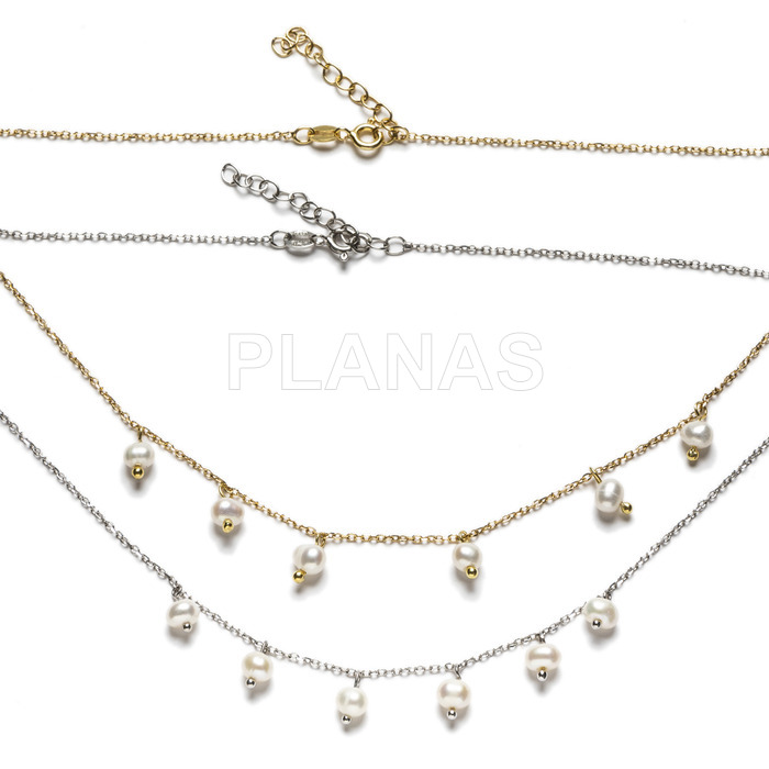 Rhodium plated sterling silver necklace with cultured pearls.