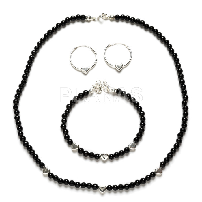 Set of necklace, bracelet and earrings in sterling silver and onyx.