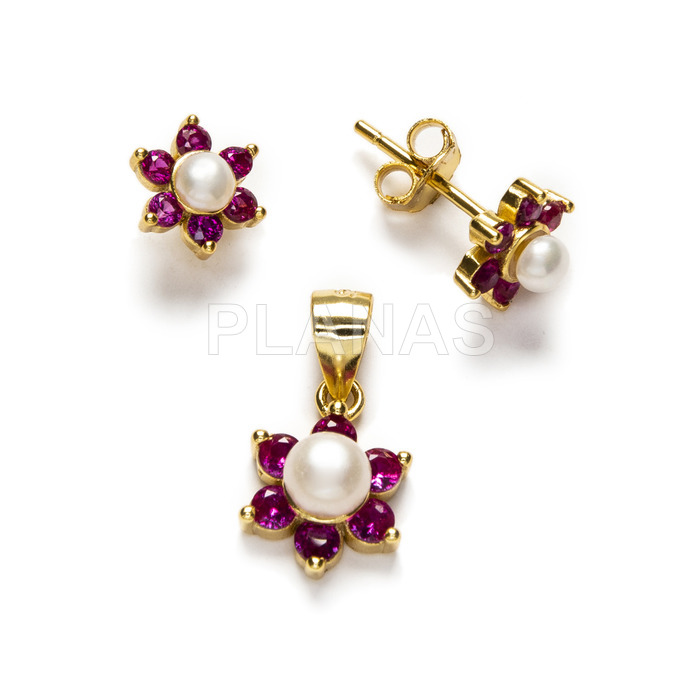 Set in sterling silver and gold bath with zircons and cultured pearl.