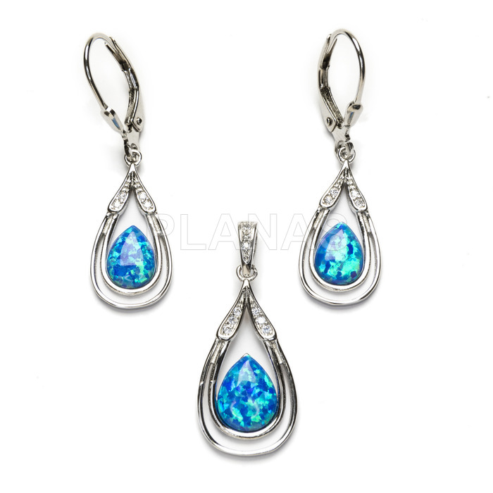 Set in rhodium-plated sterling silver and opal.