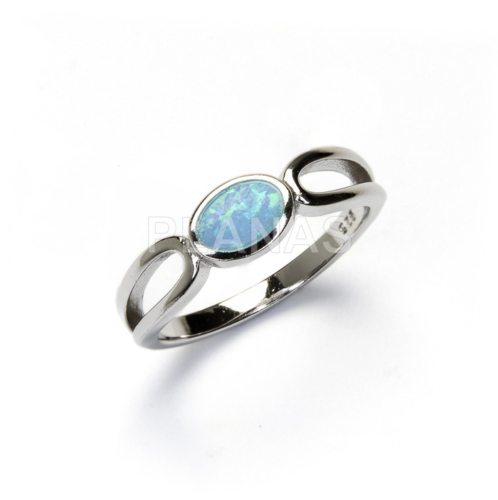 Rhodium plated sterling silver ring. blue opal.