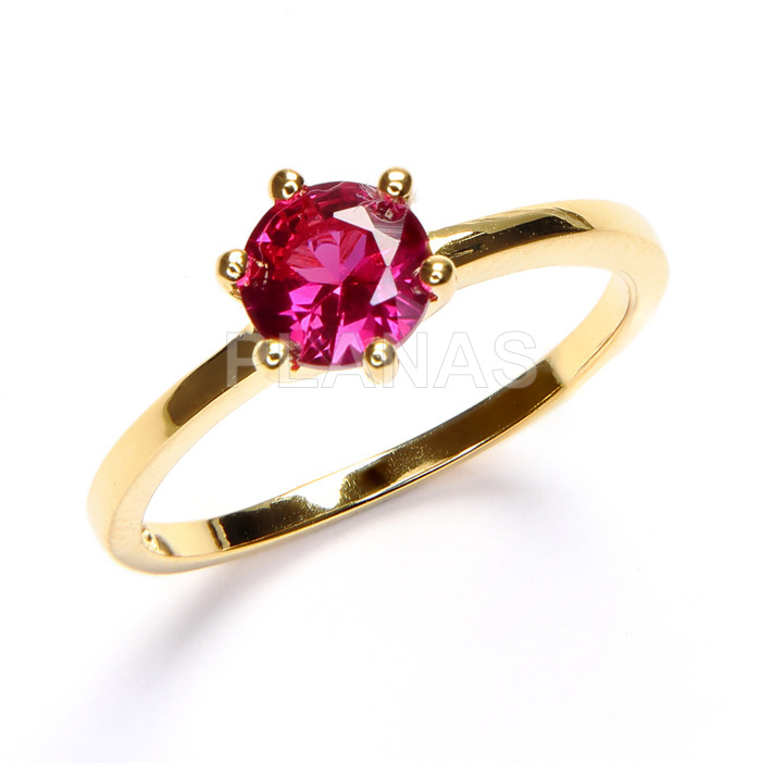 Sterling silver and gold plated one micron ring with ruby zirconia.