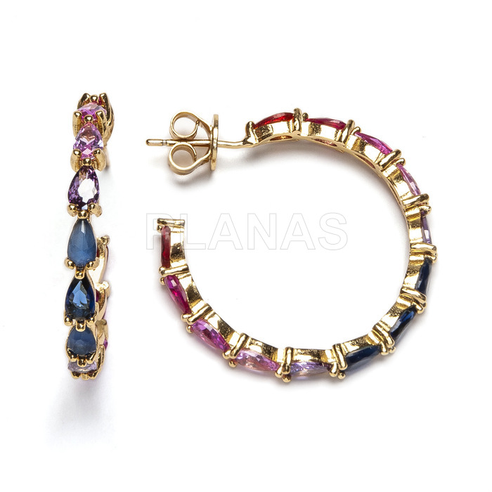 Hoops in sterling silver and gold bath with colored zircons.