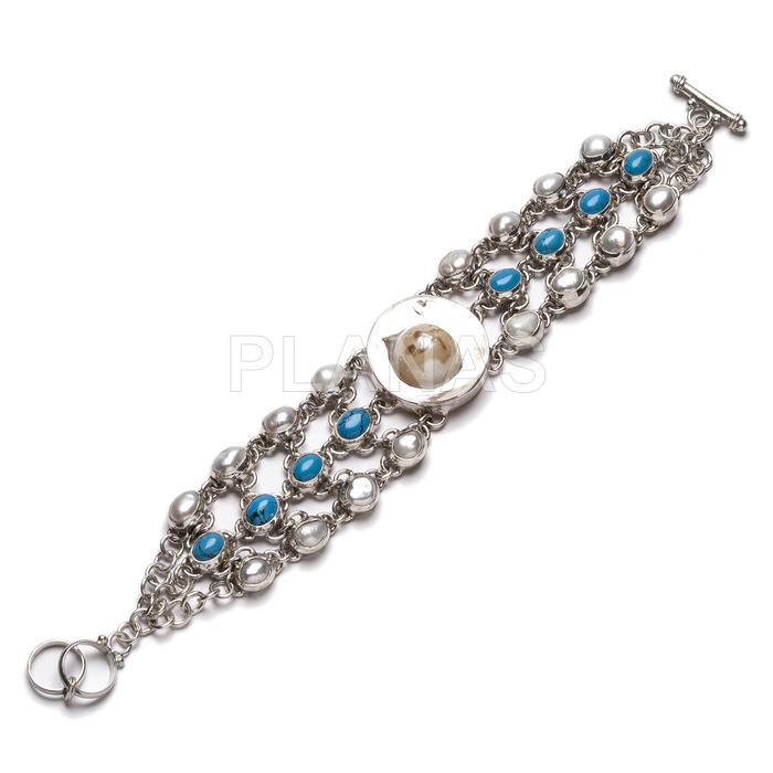 Sterling silver bracelet with cultured pearls and turquoise.